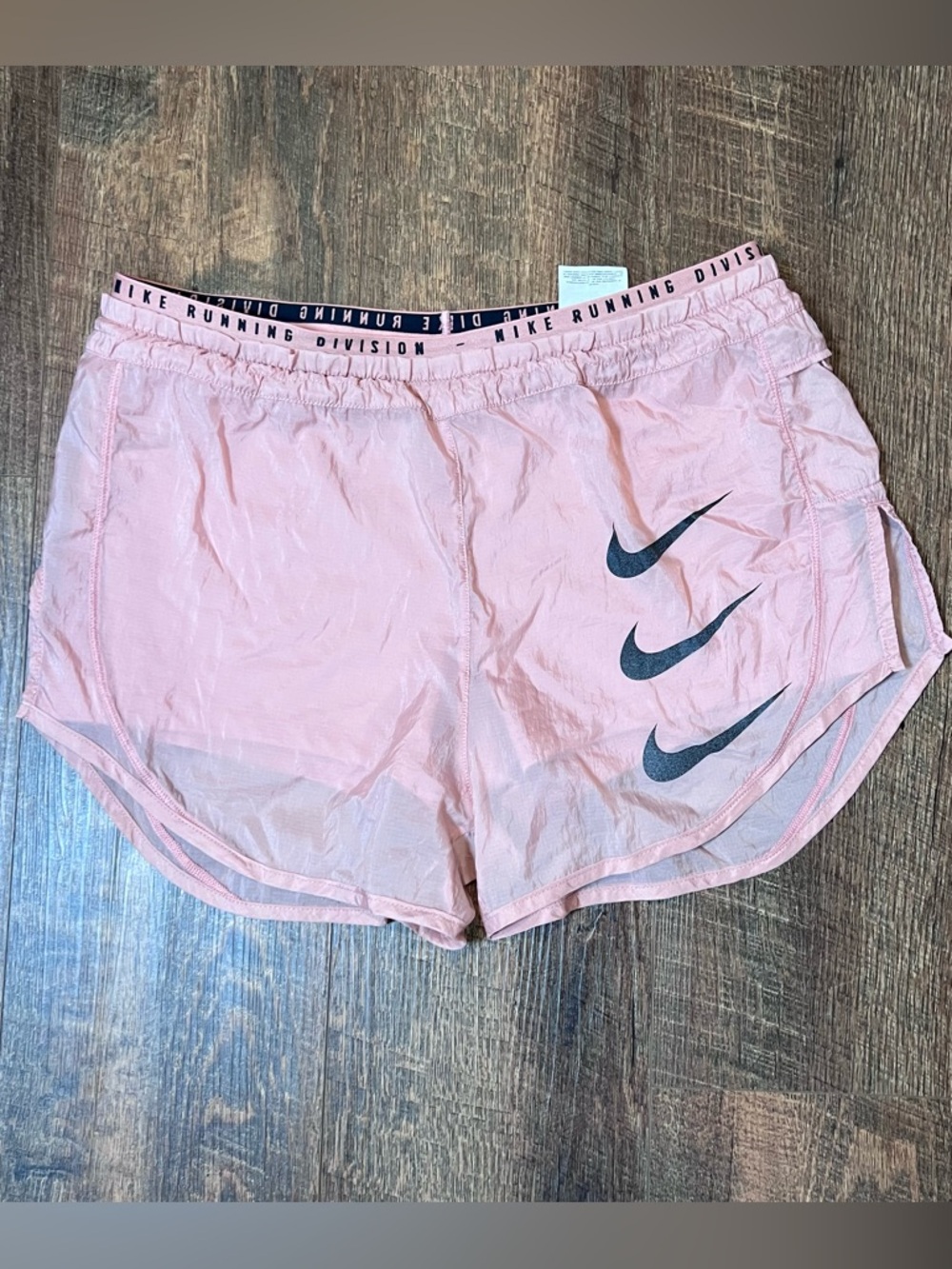 Nike Women's Light Pink Running Shorts with Triple Swoosh